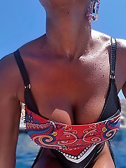 A stunning woman of a certain age poses for a series of explicit photos in which she opens her vagina.