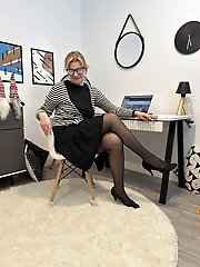 Pretty blonde mature Diana at the office in black pantyhose a steamy scene