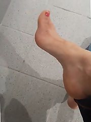 Real older whore is revealing her breasts