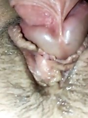 Stroking cock against clitoris