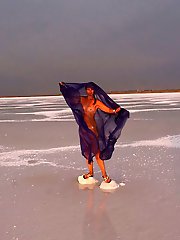 Beautiful sunset scenery by a shawl on a salt lake